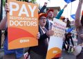 NHS resident doctors protesting outside Royal Victoria Infirmary in Newcastle