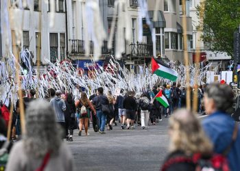 Brighton UK 18th May 2025. Over a thousand marchers took to the streets some carrying white ribbons bearing the names of children killed in the recent conflict