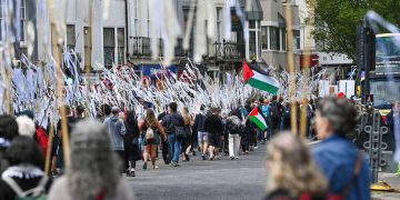 Brighton UK 18th May 2025. Over a thousand marchers took to the streets some carrying white ribbons bearing the names of children killed in the recent conflict