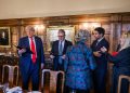 President Donald J. Trump and Prime Minister Keir Starmer review documents with aides during a working session at Chequers.