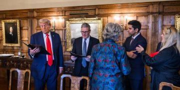 President Donald J. Trump and Prime Minister Keir Starmer review documents with aides during a working session at Chequers.