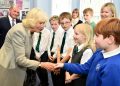 The Duchess of Cornwall meets school children as she visits Ballyhackamore Credit Union in Belfast, Northern Ireland, as the Prince of Wales and Camilla, attend a series of engagements in Northern Ireland following their two day visit in the Republic of Ireland.
